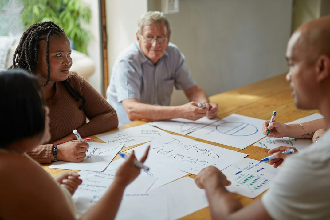 diverse group discussing inequality