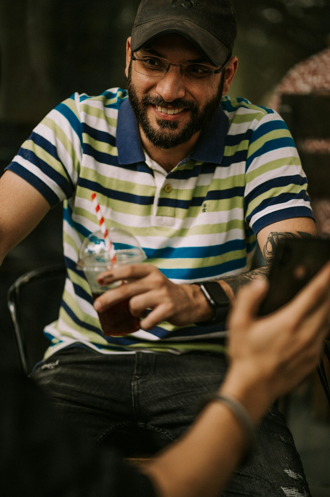 Diverse group of adults sitting around a table discussing during a focus group