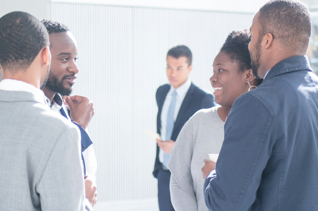 diverse group discussing inequality