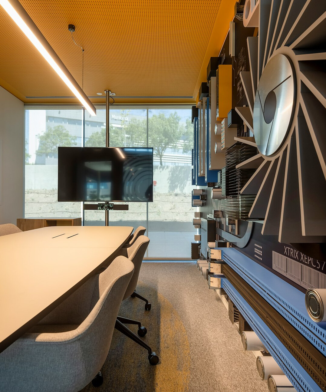 Modern research institute office with glass-walled meeting room